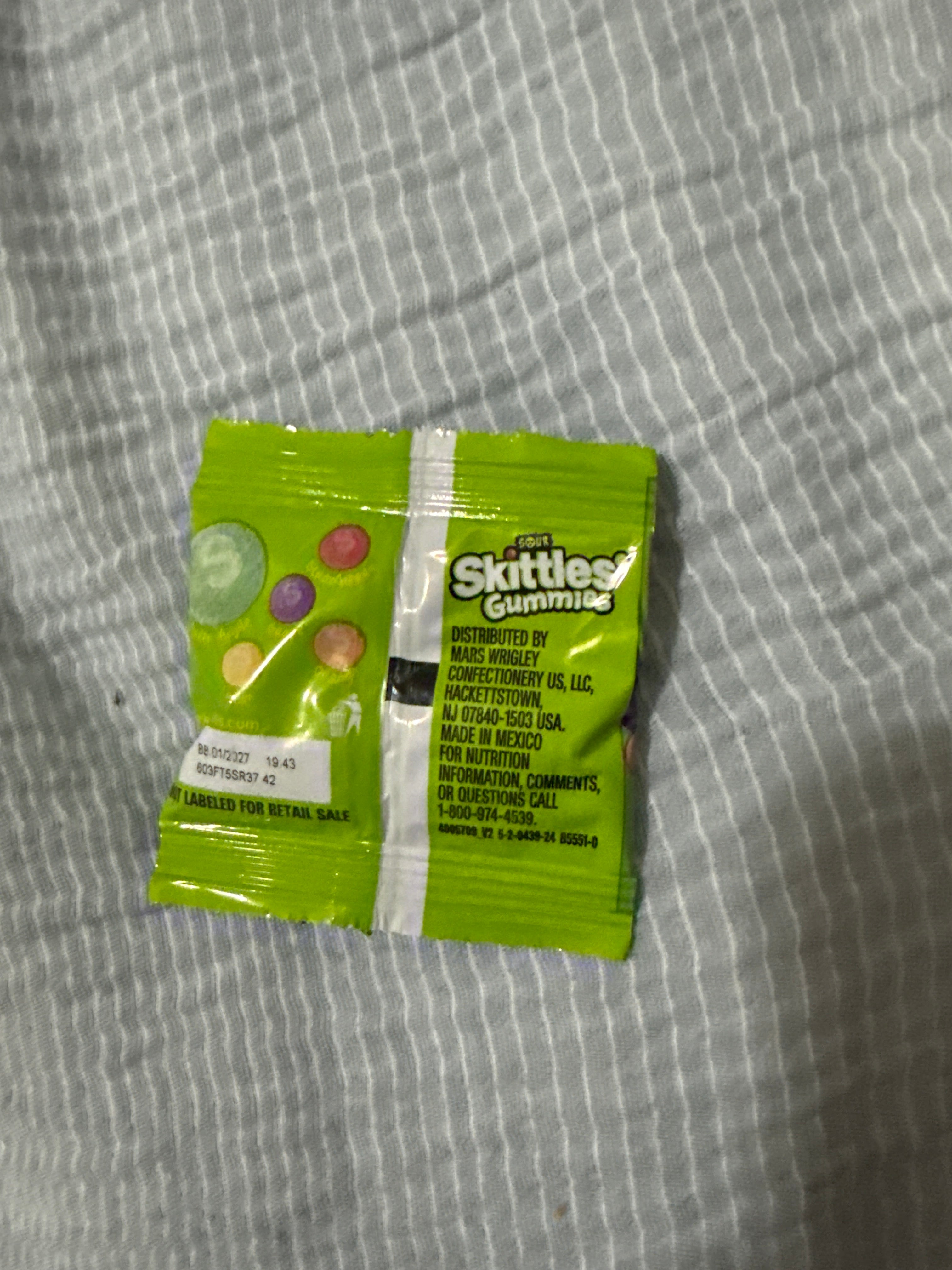 Sour gummy skittles